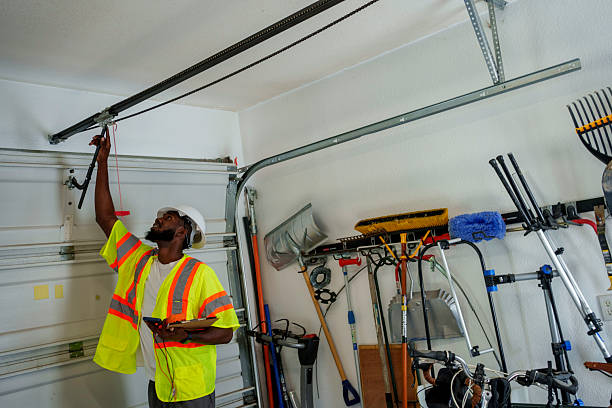 Professional Garage Door Installation technician working in Huntington, IN